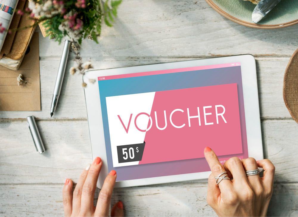 Ilustrasi voucher digital (freepik.com/rawpixel.com)
